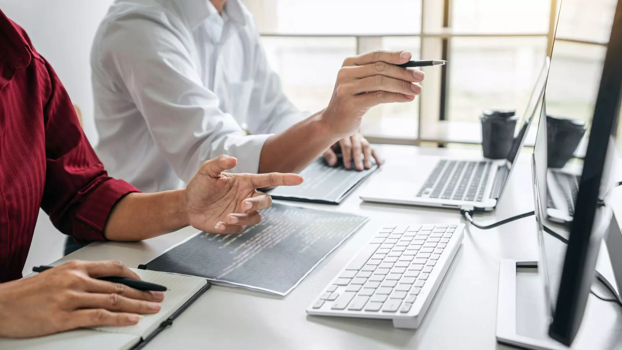 Developers building custom software for a small business